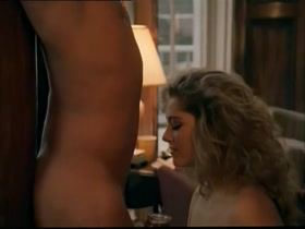 Jessica Moore strips nude for a sensual sex scene in the 1987 erotic film 11 Days 11 Nights.