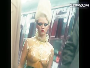 Maisie Williams shows off her prosthetic-enhanced nude body in a revealing scene from Pistol (2022).