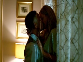 Margot Robbie shares a steamy kissing moment while topless in the 2015 movie Focus.