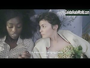 Audrey Tautou and Aïssa Maïga share a sensual lesbian moment in lingerie in Mood Indigo (2014)