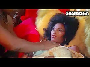 Pam Grier bares her stunning nude boobs in a steamy scene from Bucktown (1975)