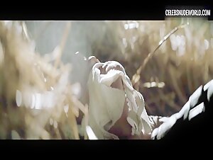 Eszter Csepai flashes her bush and sideboob in a striking nude scene from Strangled (2016).