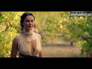 Bella Dayne flaunts her cleavage outdoors in a steamy scene from Troy: Fall of a City (2018)
