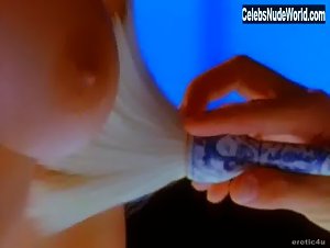 Cristy Thom seductively poses nude in a sultry scene from Playboy: Asian Exotica (1998)