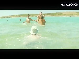 Elli Tringou and Milou Van Groesen show off their bare butts in a steamy nude scene from Suntan (2016)