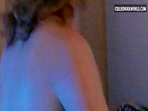 Amber West bares her breasts in a seductive bedroom scene from Paranormal Sex Tape (2016)