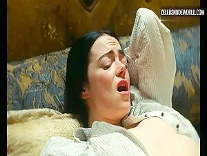Emma Stone and Suzy Bemba Couch Scene in Poor Things (2023)