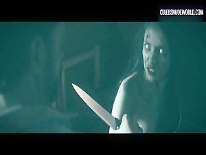 Pony Wave bares her breasts in a seductive nude scene from Bornless Ones (2016)