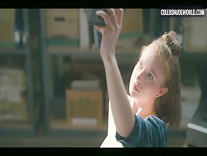 Hannah Einbinder takes a seductive selfie in a sexy scene from Hacks (2021)