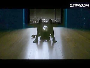 Jena Malone goes nude in a shadowy distant scene from The Neon Demon (2016)