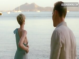 Blonde Elizabeth Debicki bares all in a seductive nude water scene from The Night Manager (2016)