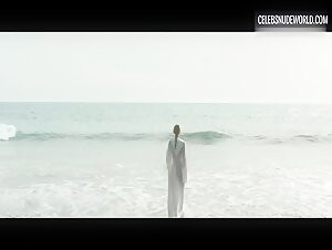 Ingrid García Jonsson swims fully nude in the crashing ocean waves in Acantilado (2016)