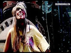 Blonde Candice Starks gets fully nude in a tense axe scene from Survival Knife (2016)