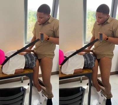 This Jamaican schoolgirl got bent over the desk and fucked hard while wearing her uniform and pink balaclava