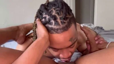 Ebony Pussy Eating as a Dreadlocked Lover Licks Her Out on the Bed