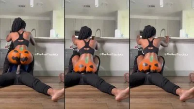 Ebony Reverse Cowgirl on the Kitchen Floor With a Pumpkin Painted Ass